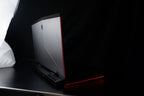 Gaming laptop rear three-quarter partially open
