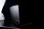 Gaming laptop keyboard close-up red backlight